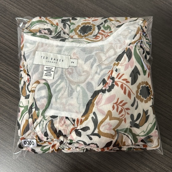 NWOT! Ted Baker BRIENNA
Tie Front Blouse with Bishop Sleeve - Picture 7 of 7